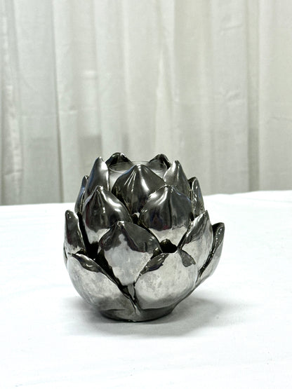 Steel candleholder