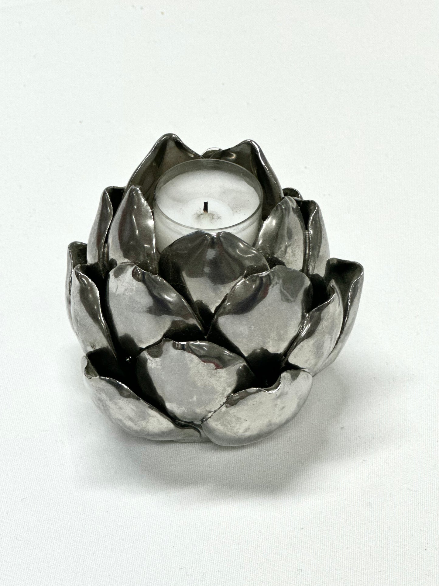Steel candleholder