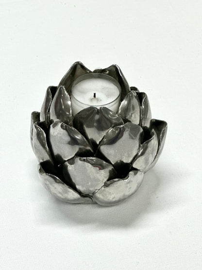 Steel candleholder