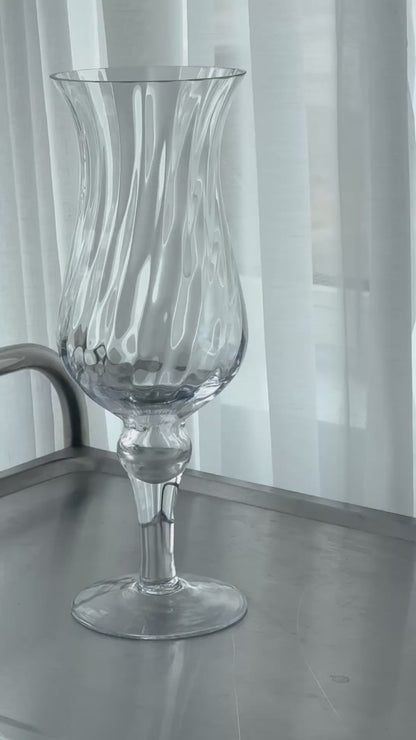 Swirling vase on foot