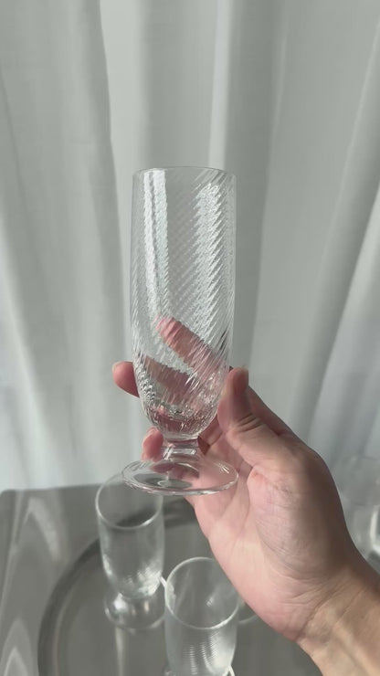 Swirling tall glasses